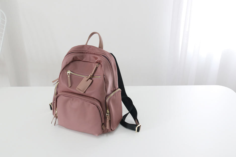 Nylon cloth with cowhide backpack