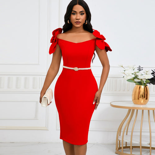 A model wearing a fitted red midi dress featuring off-the-shoulder 3D flower sleeves and a pearl-embellished waist belt.