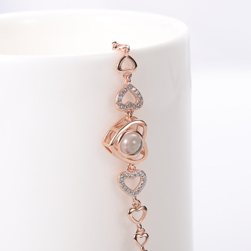 Women's Hollow Heart Projection Sterling Silver Bracelet