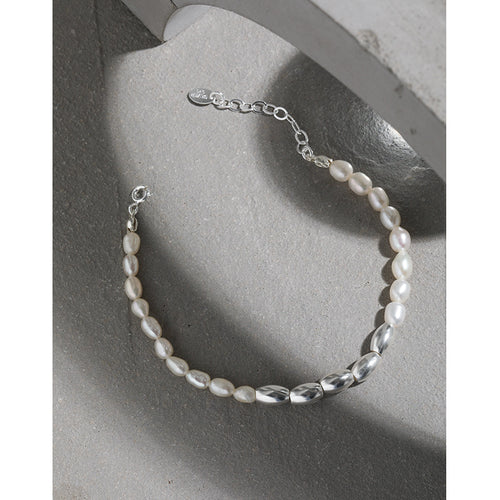 Armband i sterlingsilver med pärlor