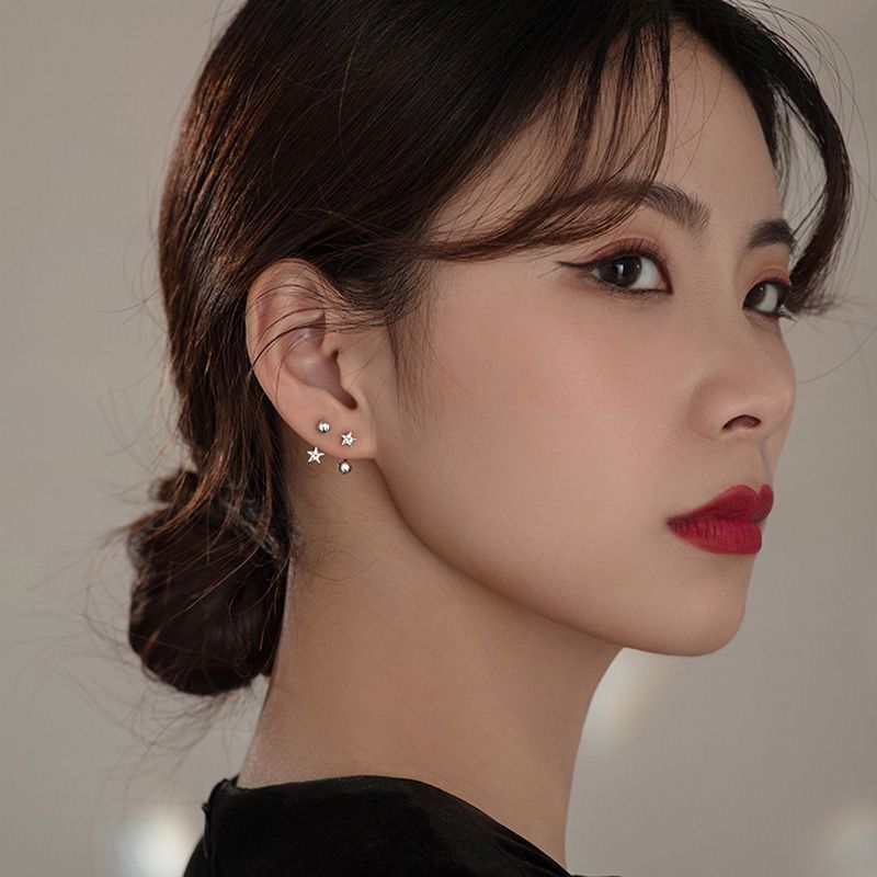 Geometric cross earrings
