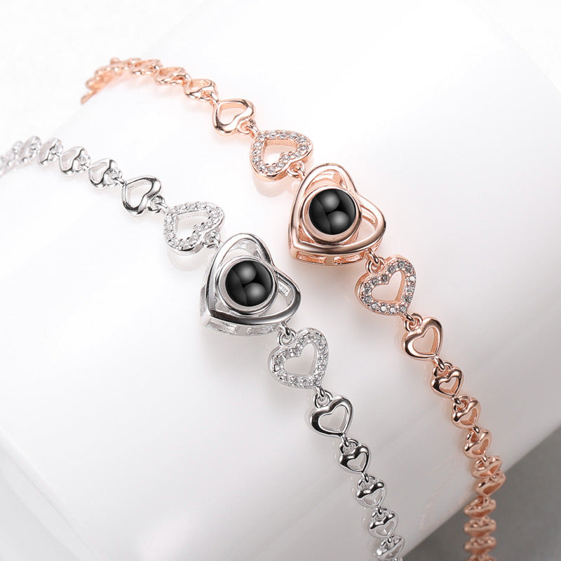 Women's Hollow Heart Projection Sterling Silver Bracelet